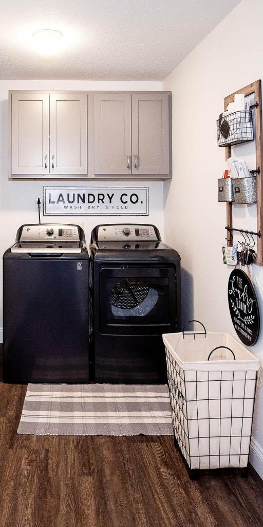 laundry room with gray cabinets
