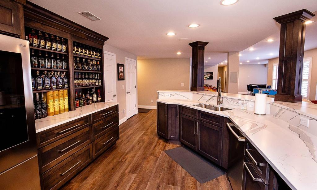 dark wood cabinets with light counters