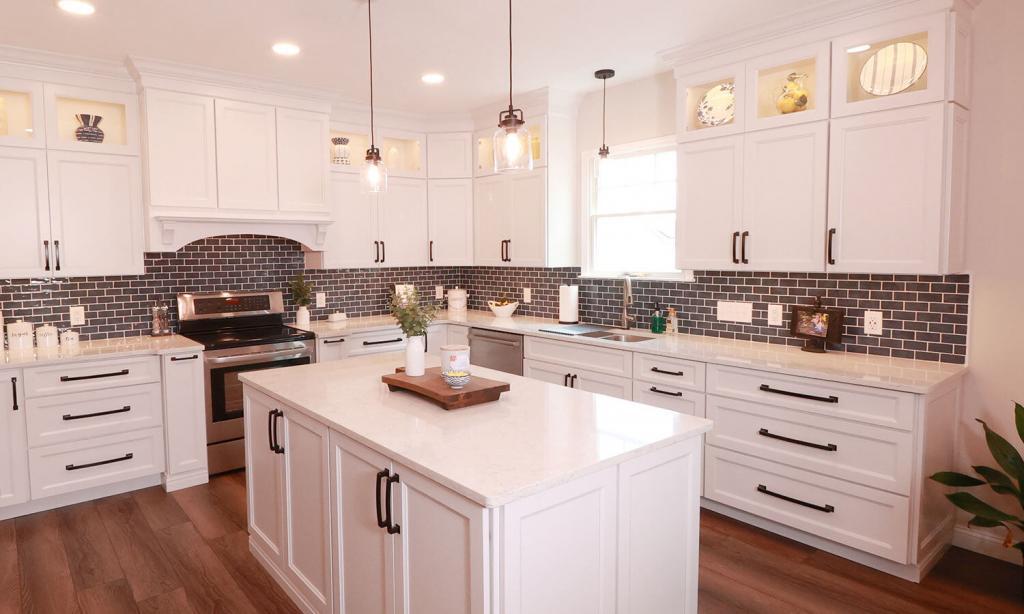 Kitchen with modern white cabinets and tile backsplash