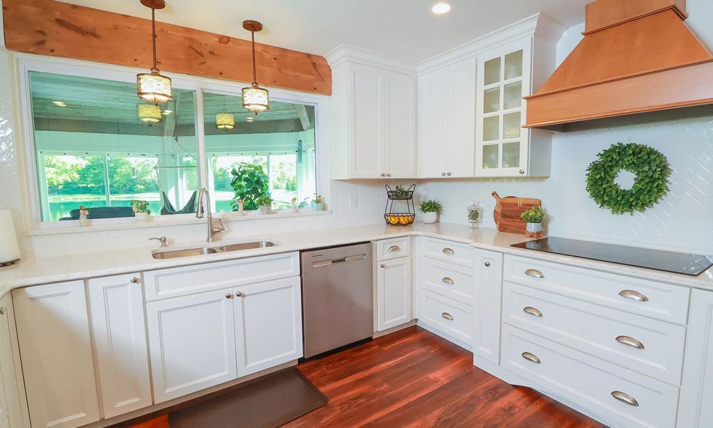 Kitchen with modern white cabinets and tile backsplash