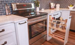 Kitchen with modern white cabinets and tile backsplash