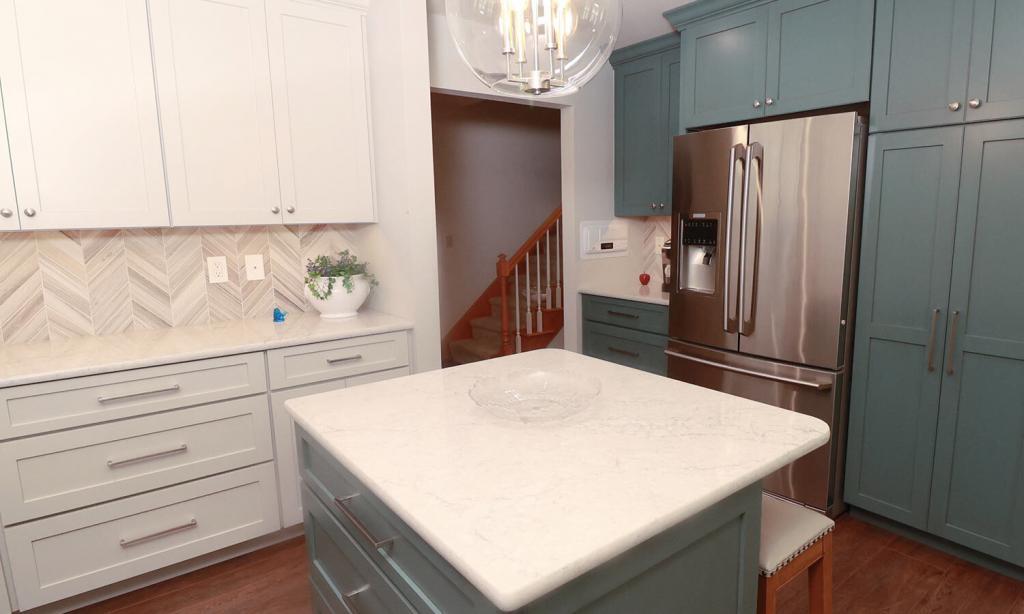 white and teal cabinets in a kitchen