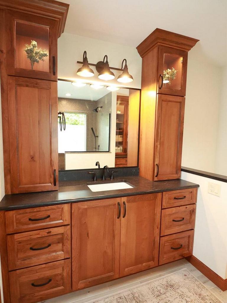 bathroom vanity with blacck counters