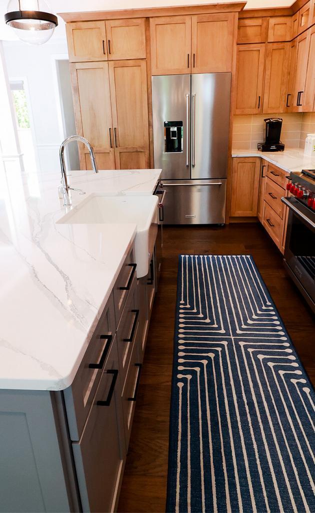 newly designed kitchen with quartz counters