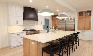 modern kitchen with a black vent hood