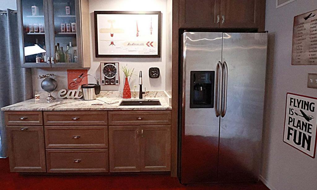 neutral cabinets with stainless steel refrigerator