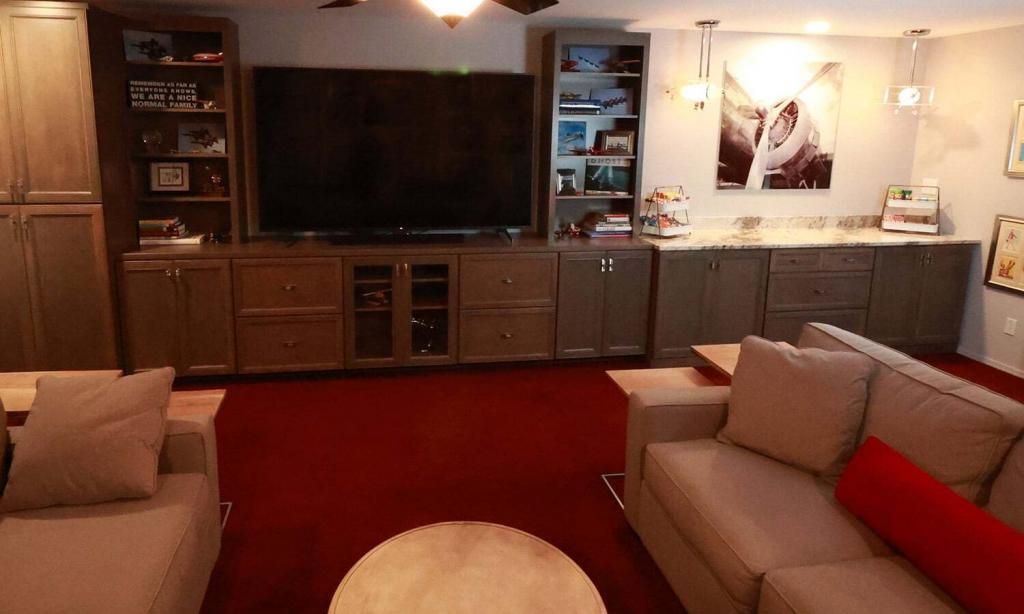 living spaces with red carpet